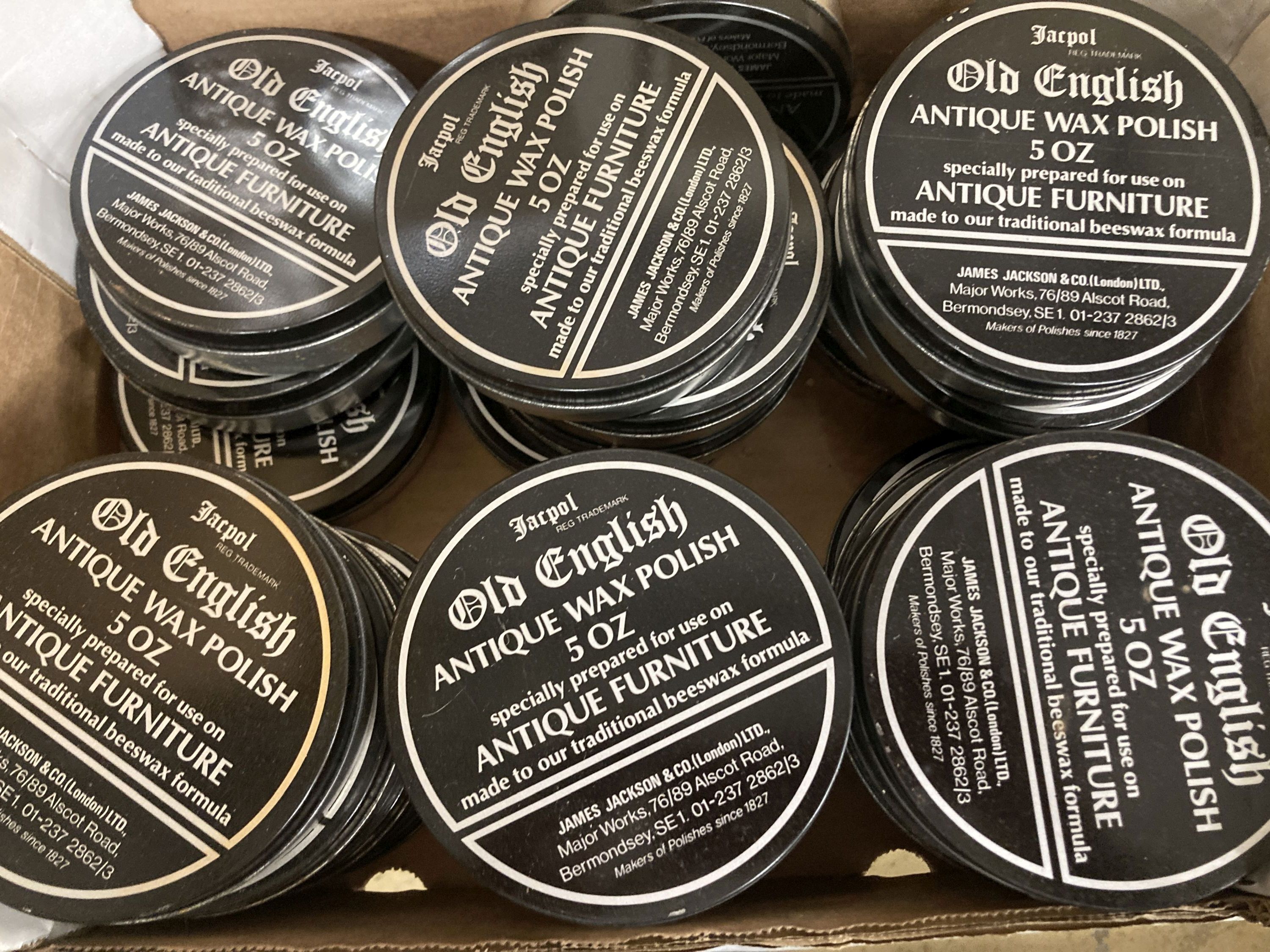 Approximately 96 tins of Old English antique wax polish- dark